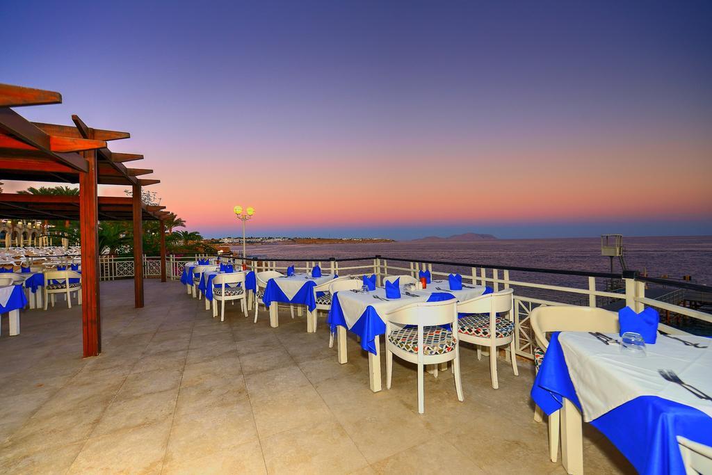 فندق وسبا ستيلا دي ماري بيتش شرم الشيخ المظهر الخارجي الصورة Sunset at the restaurant