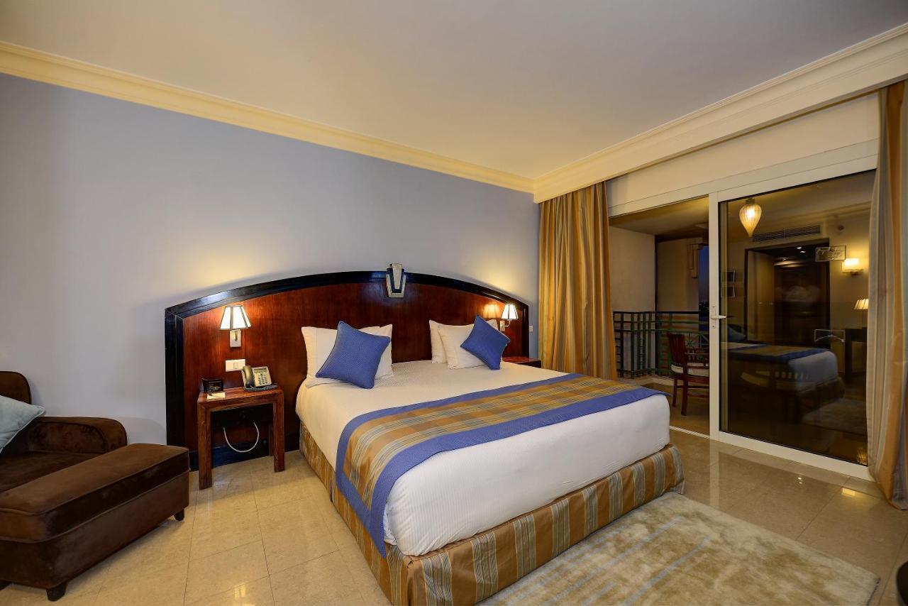فندق وسبا ستيلا دي ماري بيتش شرم الشيخ المظهر الخارجي الصورة A bedroom at the hotel